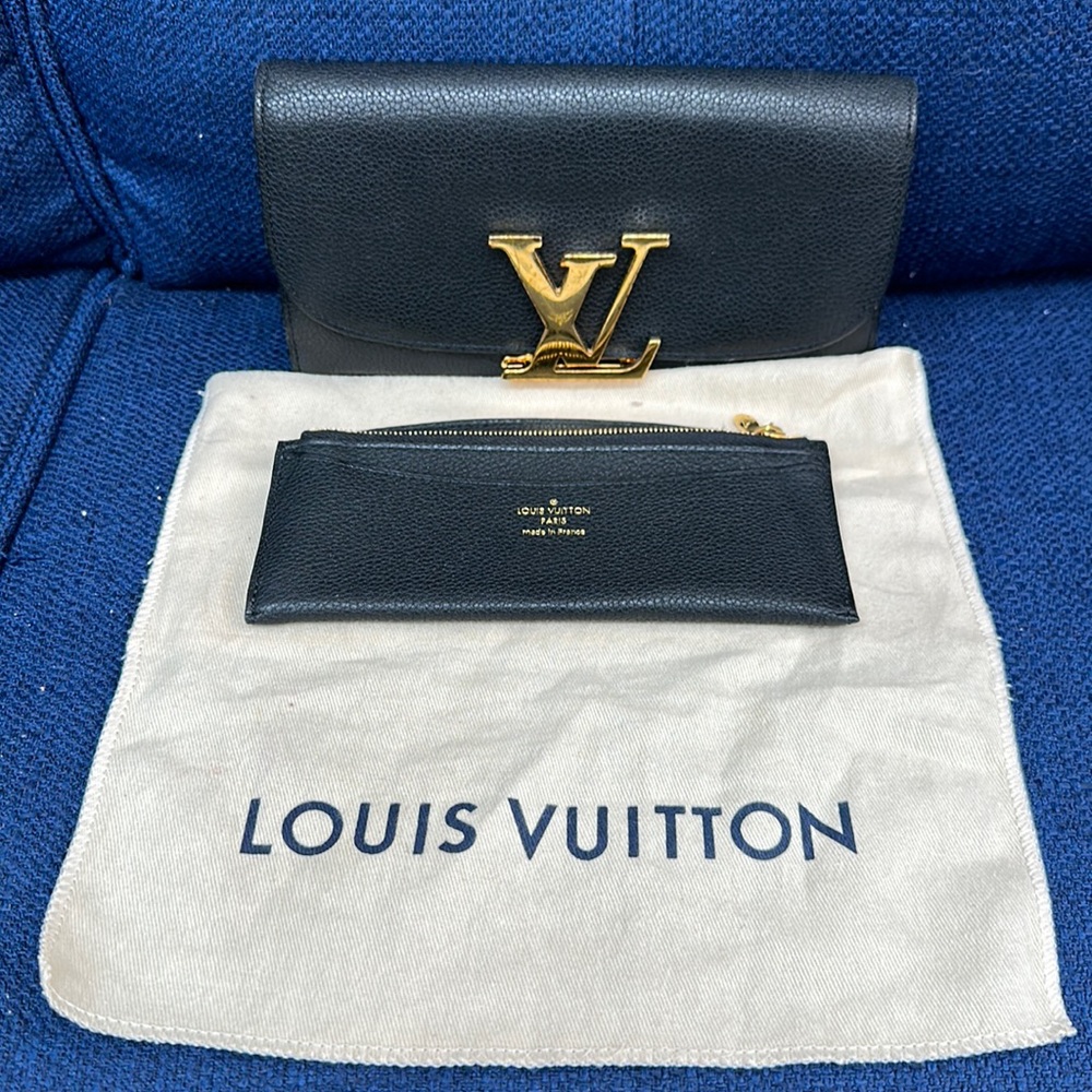 Louis Vuitton black wallet with insert!